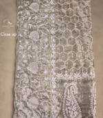 Close-up of sequins and hand embroidery on Tissue Silk Chikankari