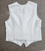 White Lucknowi Chikankari waistcoat for women with hand embroidery and tailored fit, available from Fiza Chikan Dubai, UAE.