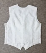 White Lucknowi Chikankari waistcoat for women with hand embroidery and tailored fit, available from Fiza Chikan Dubai, UAE.