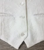 White Lucknowi Chikankari waistcoat for women with hand embroidery and tailored fit, available from Fiza Chikan Dubai, UAE.