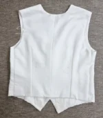 White Lucknowi Chikankari waistcoat for women with hand embroidery and tailored fit, available from Fiza Chikan Dubai, UAE.