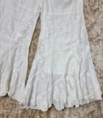 Hand embroidered Lucknowi Chikankari jalebi cut palazzo for women featuring floral motifs and a layered flared hem
