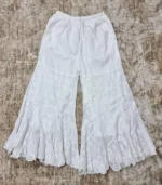 Hand embroidered Lucknowi Chikankari jalebi cut palazzo for women featuring floral motifs and a layered flared hem