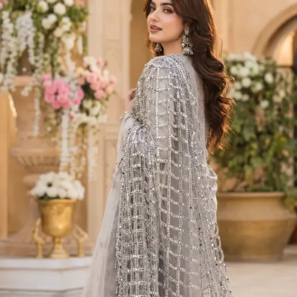 Women's dupatta featuring handcrafted mirror work lace in a geometric square pattern with silver tassel detailing
