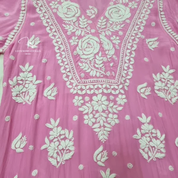Pink Lucknowi Chikankari kurta with white hand embroidery, bell sleeves, and floral detailing, available from Fiza Chikan Dubai, UAE.