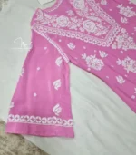 Pink Lucknowi Chikankari kurta with white hand embroidery, bell sleeves, and floral detailing, available from Fiza Chikan Dubai, UAE.