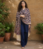 Shop a beige Ajrakh Modal Satin dupatta with deep blue and red motifs, finished with a lustrous Lagdi Patta border and tassels. Available in Dubai, UAE.